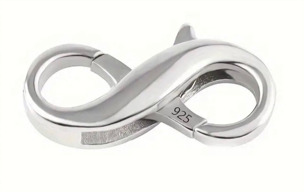 Sterling silver double lobster claw clasps, stainless steel charm keepers, 925 earring rings/charm holders and other miscellaneous jewelry items.