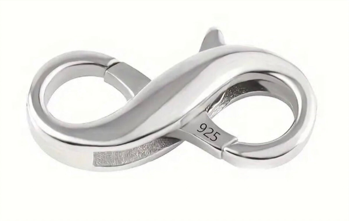Sterling silver double lobster claw clasps, stainless steel charm keepers, 925 earring rings/charm holders and other miscellaneous jewelry items.