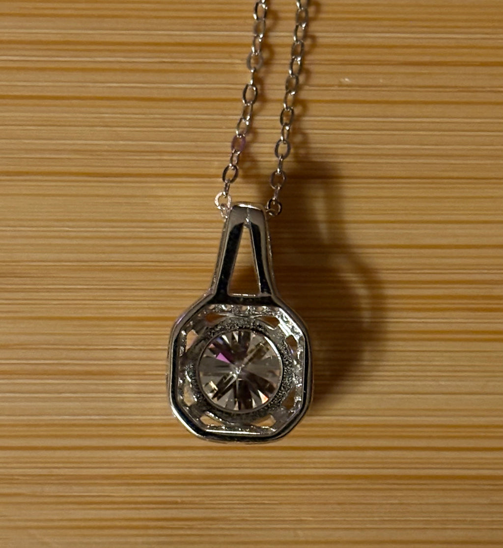 Moissanite necklace. A 2ct certified Moissanite set within an octagonally-shaped halo of pavé-set gleaming white zircons - at a 1ct price!