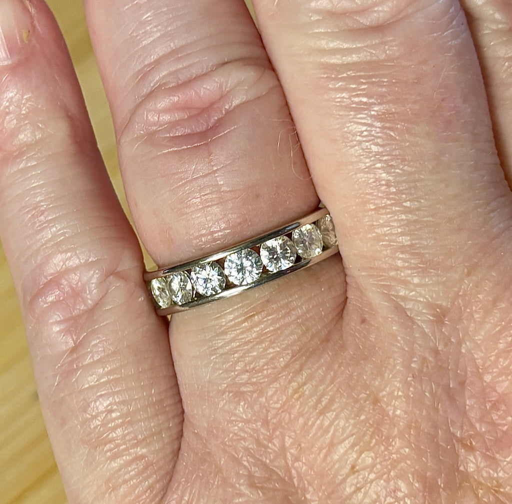 Moissanite ring. A 5.10cttw or 4.8cttw (depending on size) Moissanite eternity ring. A channel-set, classy and classic design - beautiful!