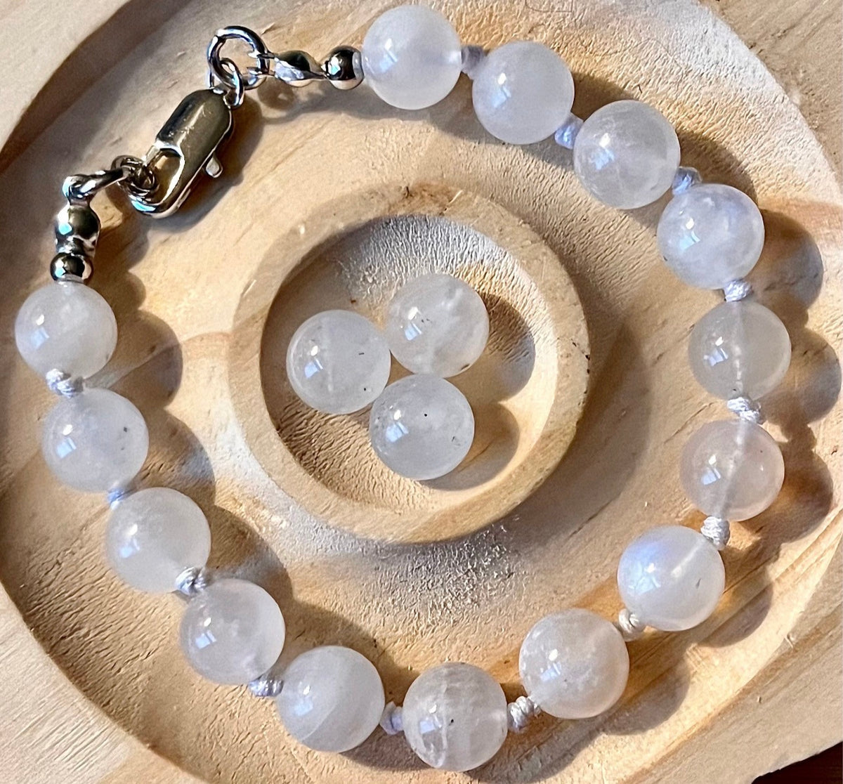 Glowing moonstone bracelet. High quality hand knotted 8mm moonstone bracelet with stainless steel or yellow gold plated stainless steel hardware!