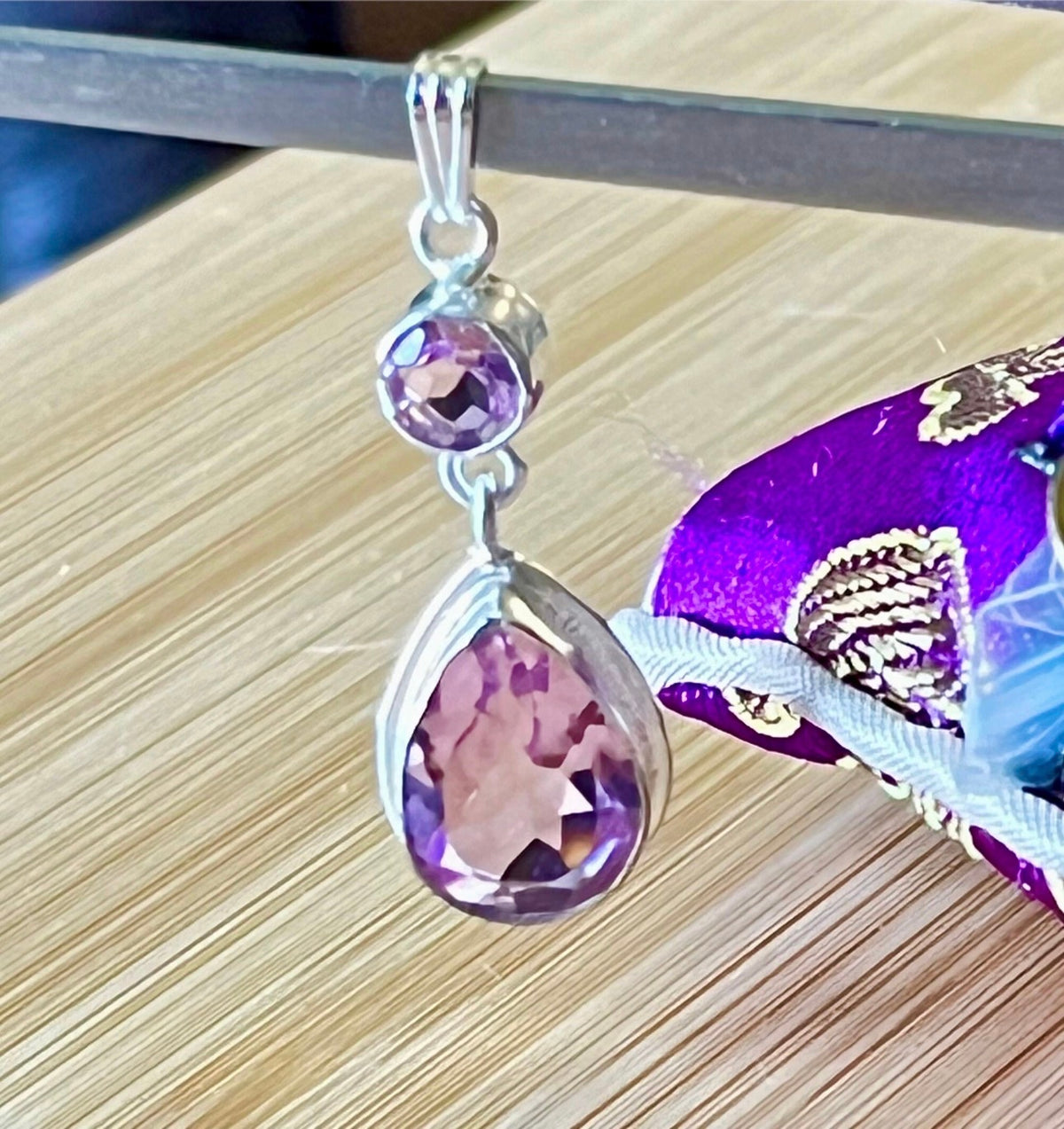 Lab tanzanite pendant and lab morganite pendants, and natural amethyst and moonstone pendants. All in solid sterling silver!