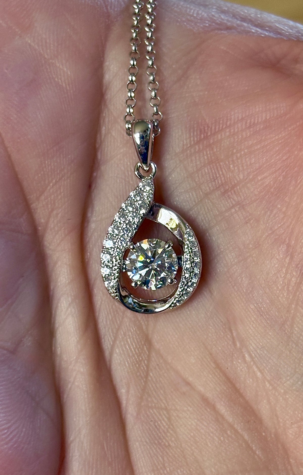 Moissanite necklace. A 1ct 8H8A certified Moissanite water drop-shaped pendant with white zircons, on a nicely weighted rolo chain with lobster claw clasp!