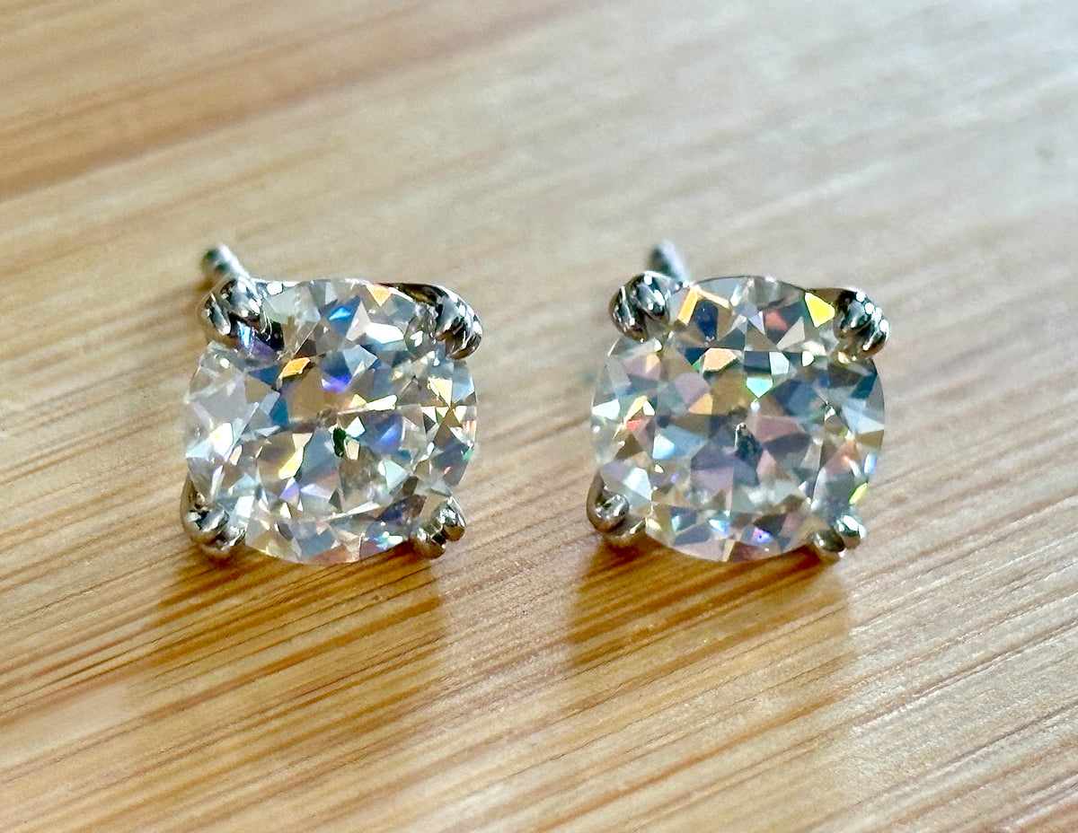 A lovely DOUBLE certified pair of 4cttw Old European Cut Moissanite studs in 935 Argentium silver and 18k double-claw mountings!
