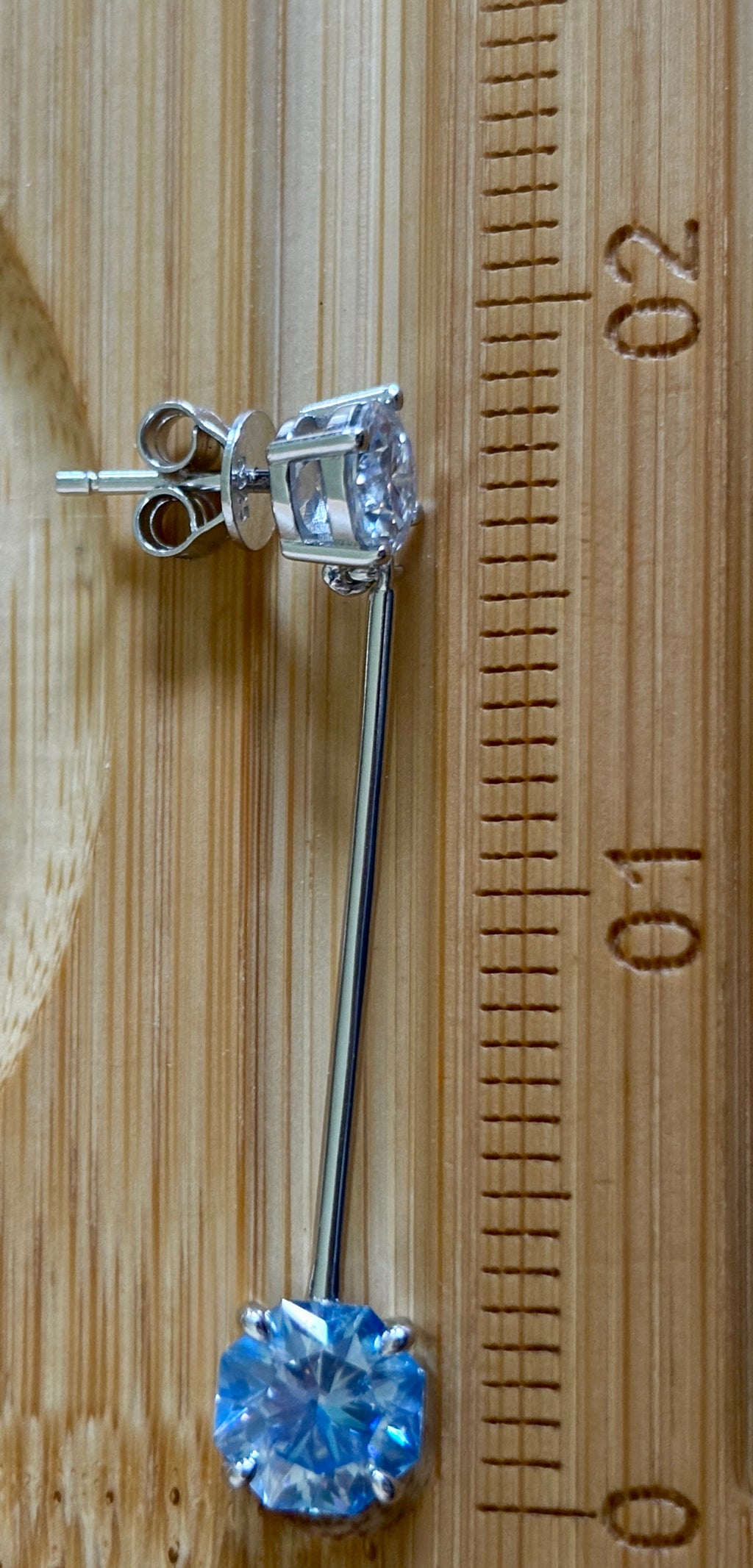 8ctw Moissanite pendulum earrings, with 3ct octagonal frosty aquamarine Moissanites at the bottom of the pendulum, and 1ct white round brilliant Moissanites at the top! Full Argentium silver construction with sterling silver disk backs! An HKJ exclusive!