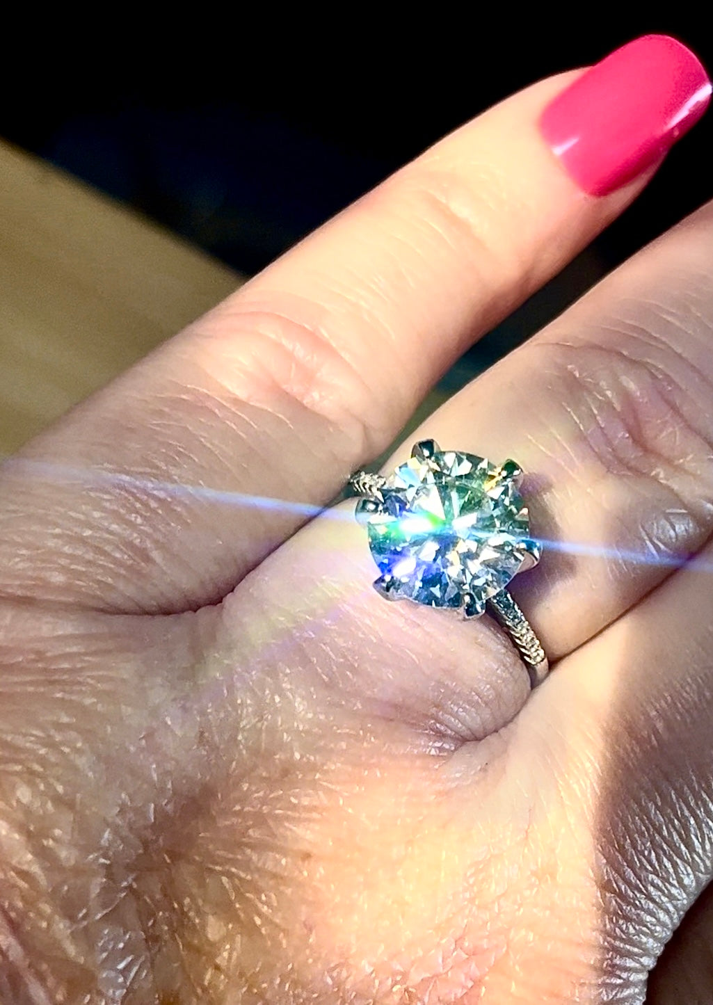 Moissanite ring. A certified 5ct Moissanite solitaire with zircon-accented shoulders, set in sterling silver and bathed in 18k!