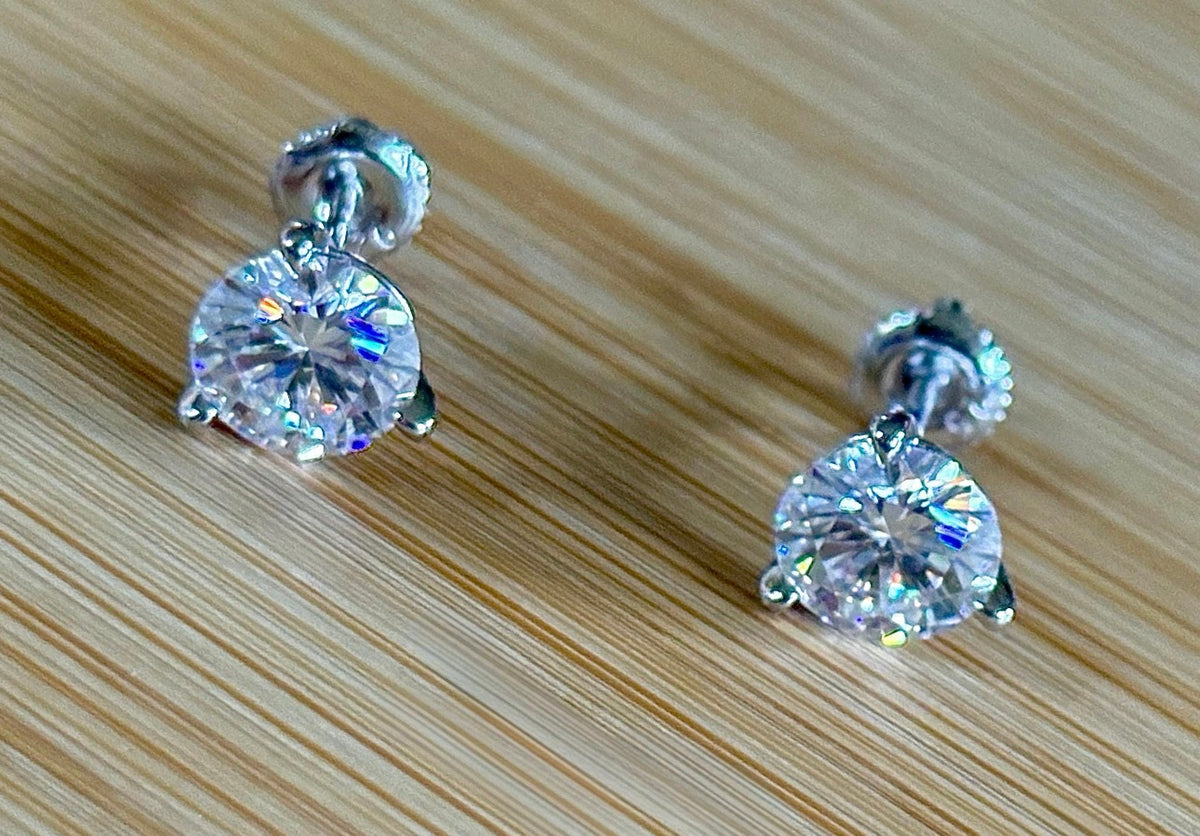 Moissanite earrings. A 4cttw certified pair of Moissanite martini studs with screw-on ear nuts - a simply elegant, classic & STUNNING pair!