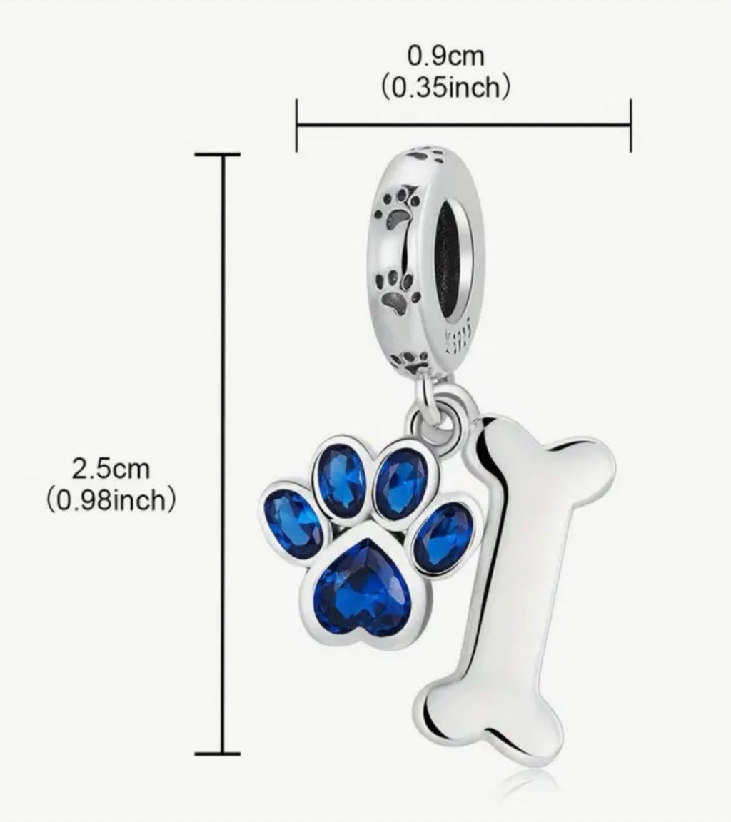 Paw print charms, dog lover charms, dog bone charms, turtle charm and cross charm! All solid sterling silver charms!