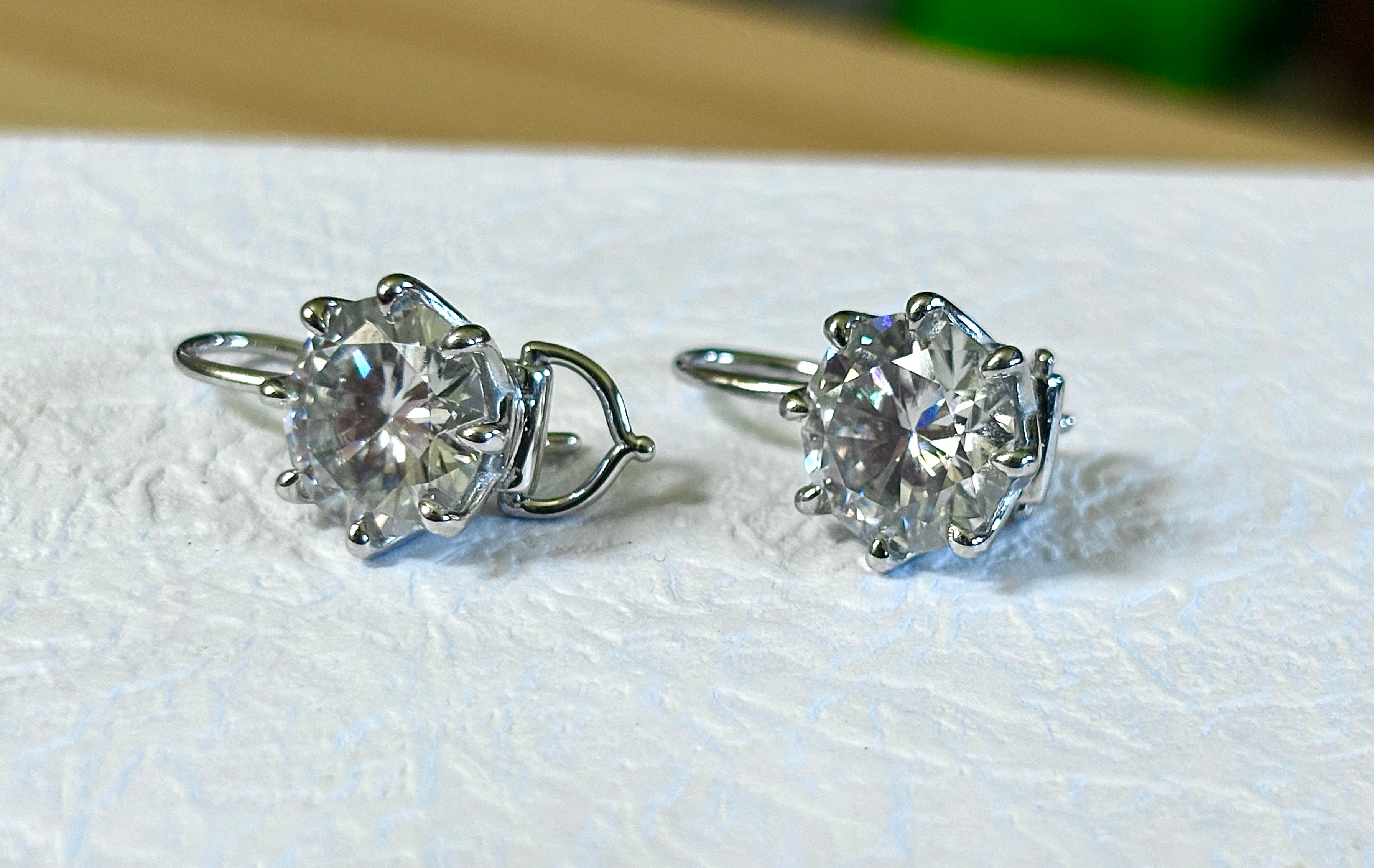 Moissanite earrings. Exclusive 8ctw double certified Moissanite fish hook earrings with *buckle backs* in 935 Argentium silver and 18k white rhodium!