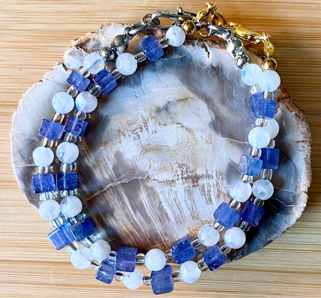 Moonstone and tanzanite bracelet. Dusky tanzanite cubes and round moonstones on stainless steel jeweler’s wire! Pretty and petite!