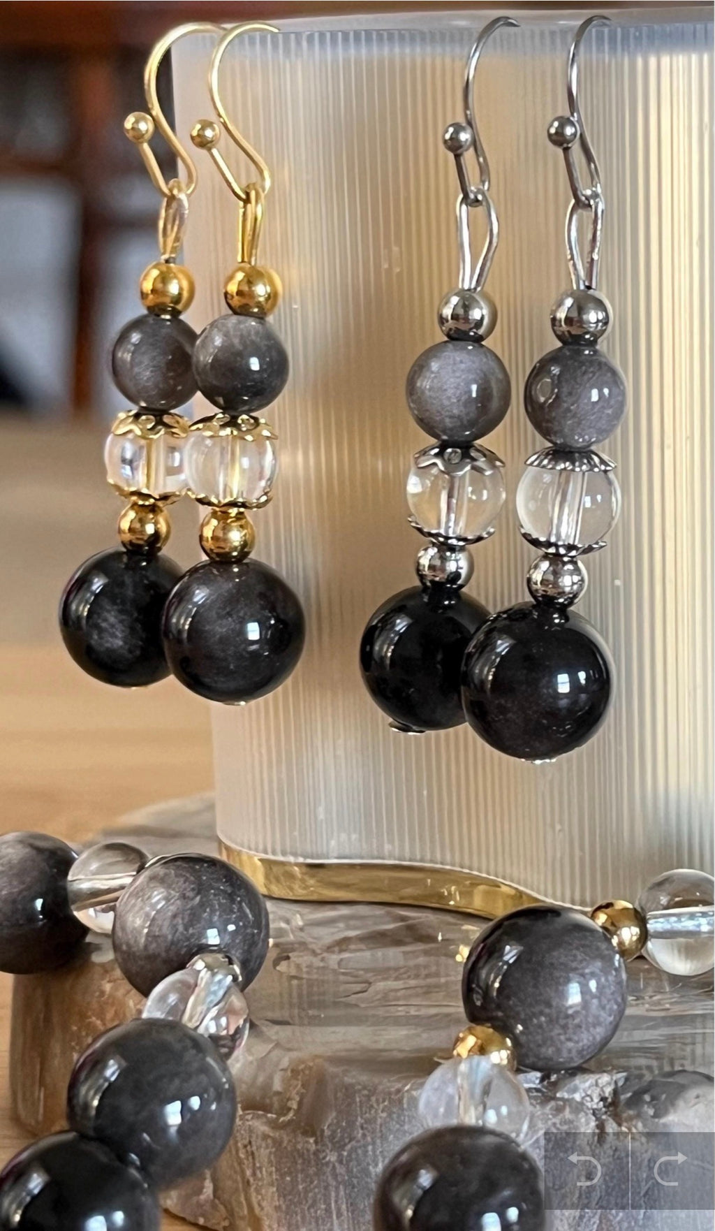 Silver sheen obsidian and clear quartz bracelet and earrings. Pair the “Silver Bells” bracelet and/or earrings with your little black party dress and be the Belle of the Ball!