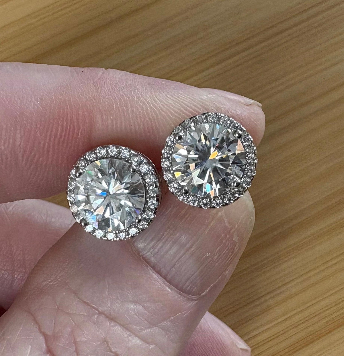 Moissanite earrings. 2.96cttw Moissanite halo stud earrings in sterling silver and 18k! Purely exquisite and red-carpet glamorous!