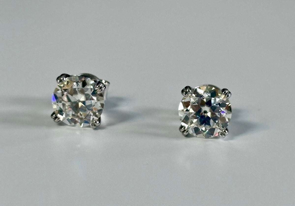 A lovely DOUBLE certified pair of 4cttw Old European Cut Moissanite studs in 935 Argentium silver and 18k double-claw mountings!