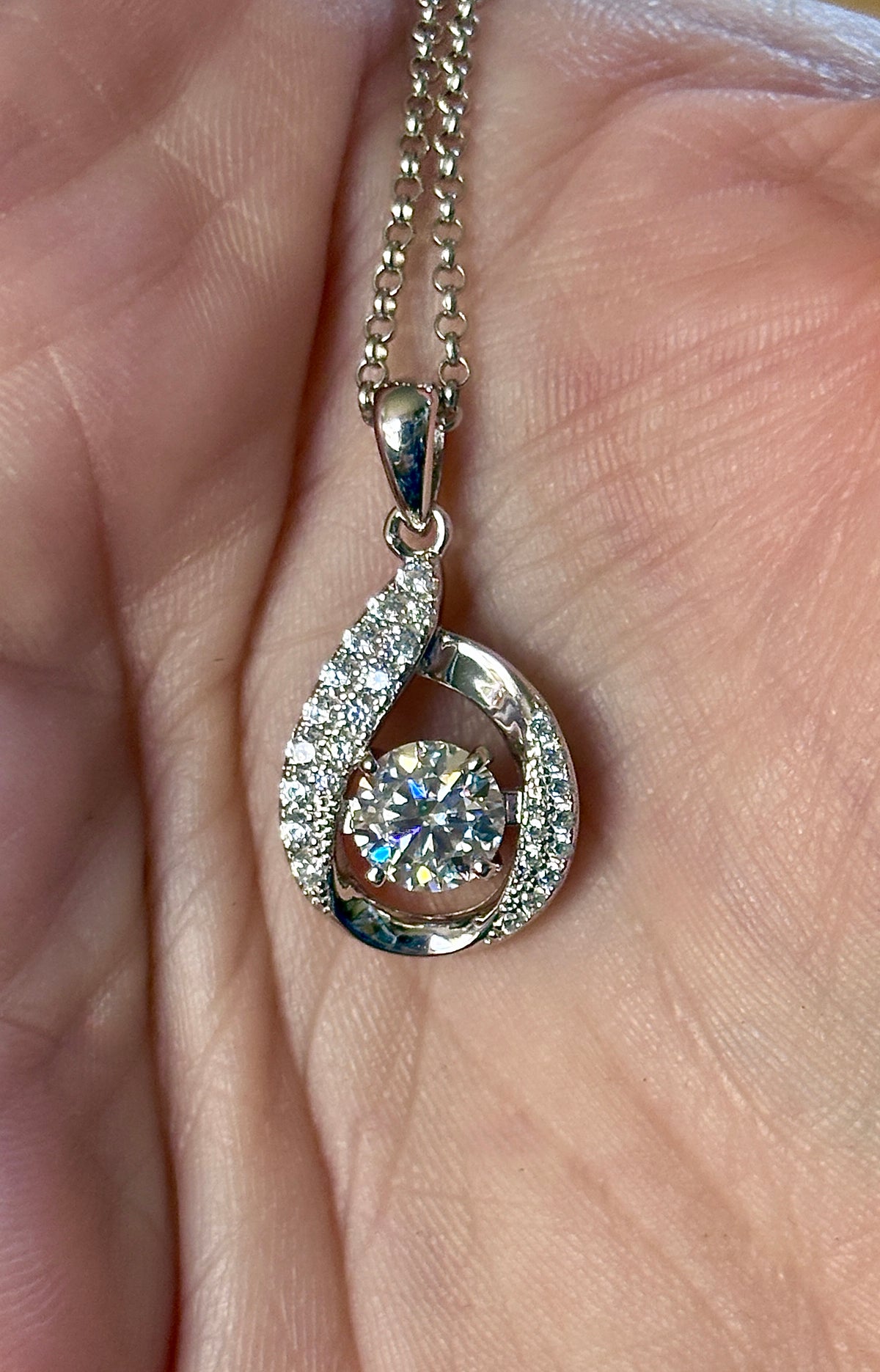 Moissanite necklace. A 1ct 8H8A certified Moissanite water drop-shaped pendant with white zircons, on a nicely weighted rolo chain with lobster claw clasp!