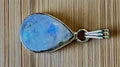 Moonstone, peach moonstone and lab “aurora” opal pendants in sterling silver!