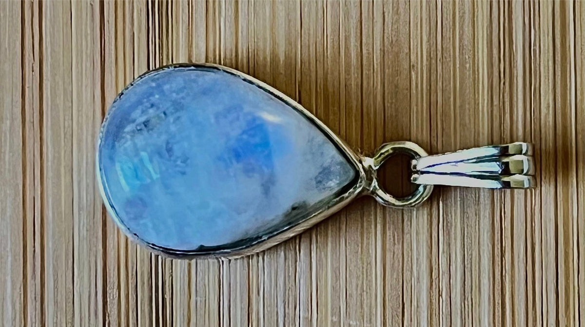 Moonstone, peach moonstone and lab “aurora” opal pendants in sterling silver!