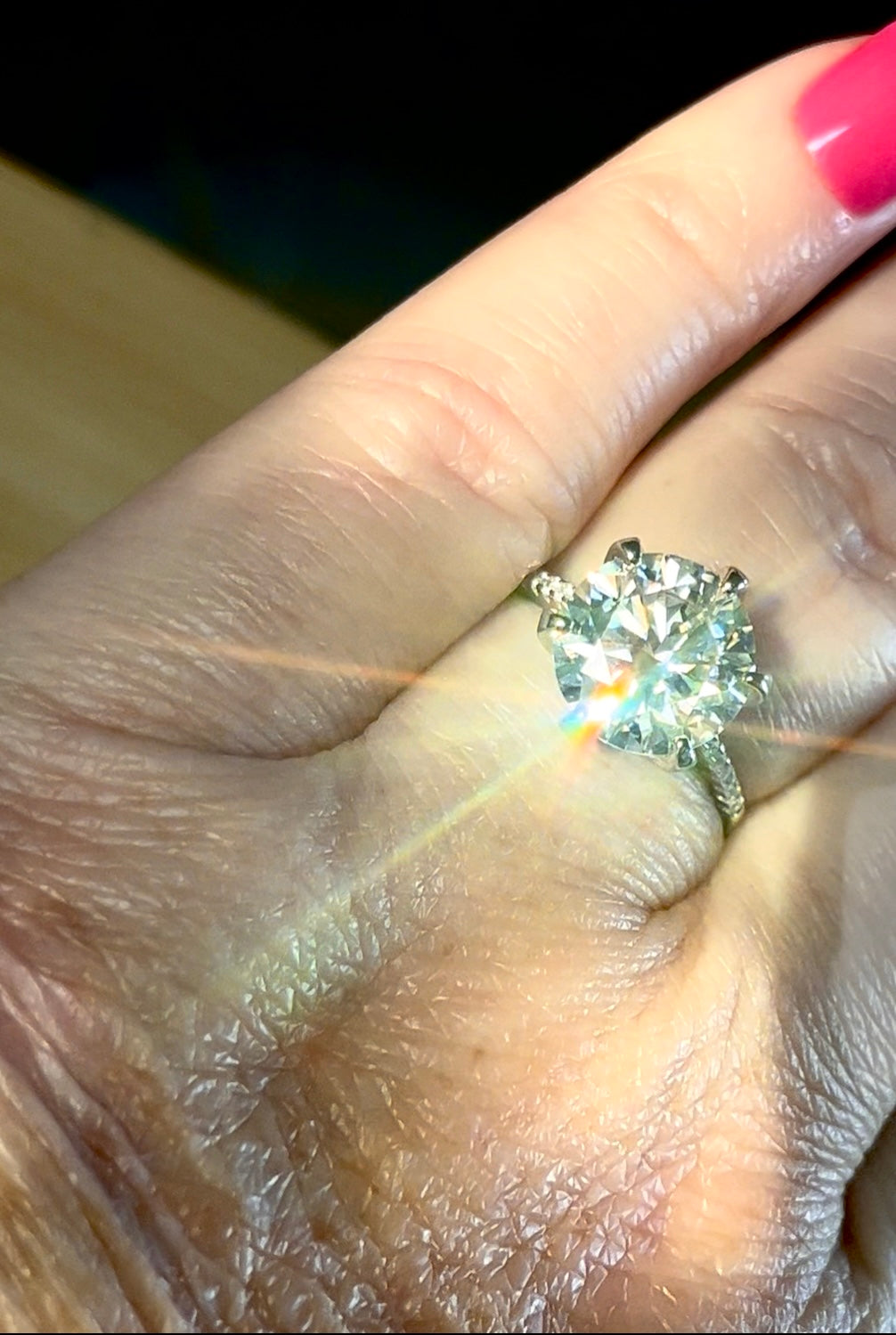 Moissanite ring. A certified 5ct Moissanite solitaire with zircon-accented shoulders, set in sterling silver and bathed in 18k!