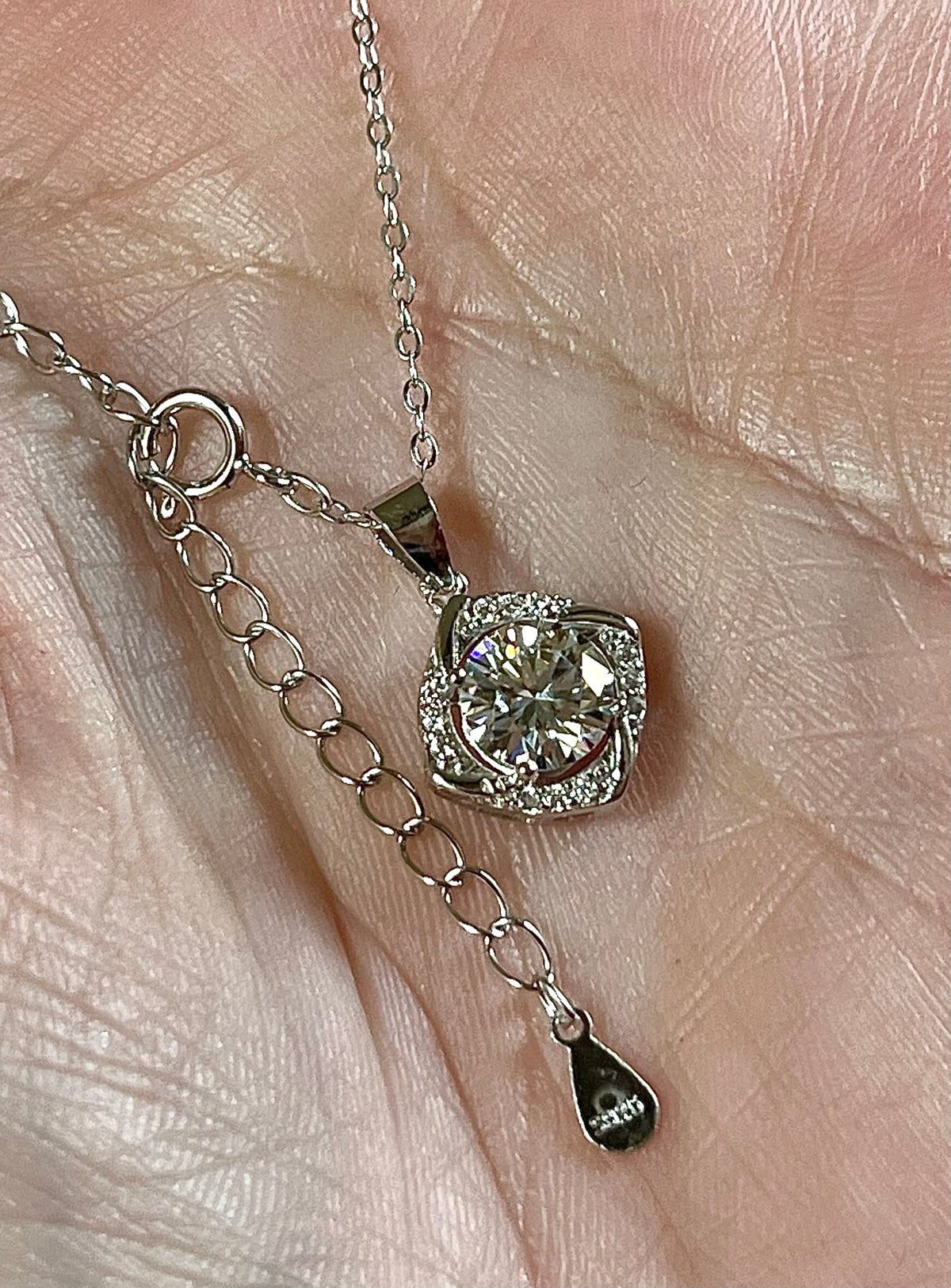 Moissanite necklace. Certified 1ct Moissanite “Quasar” design pendant! Be the star of the show wearing this unique, contemporary design!