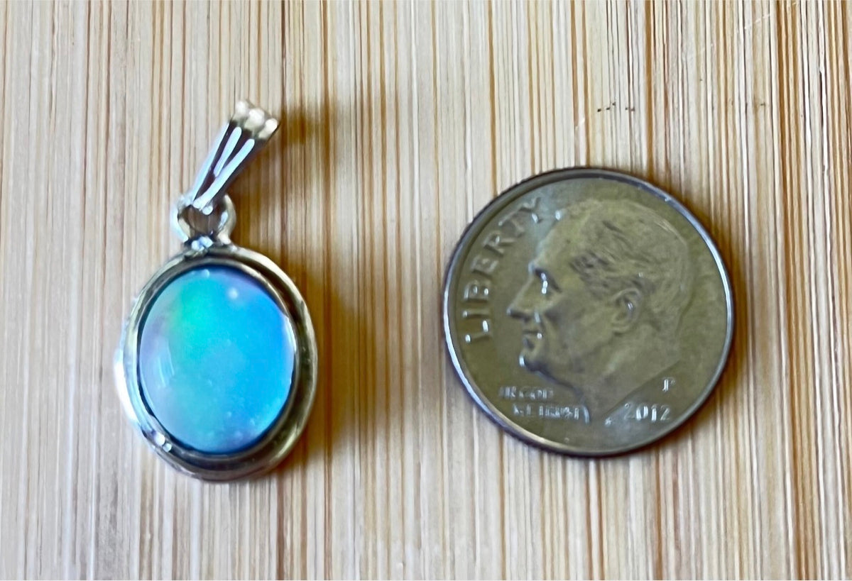 Moonstone, peach moonstone and lab “aurora” opal pendants in sterling silver!