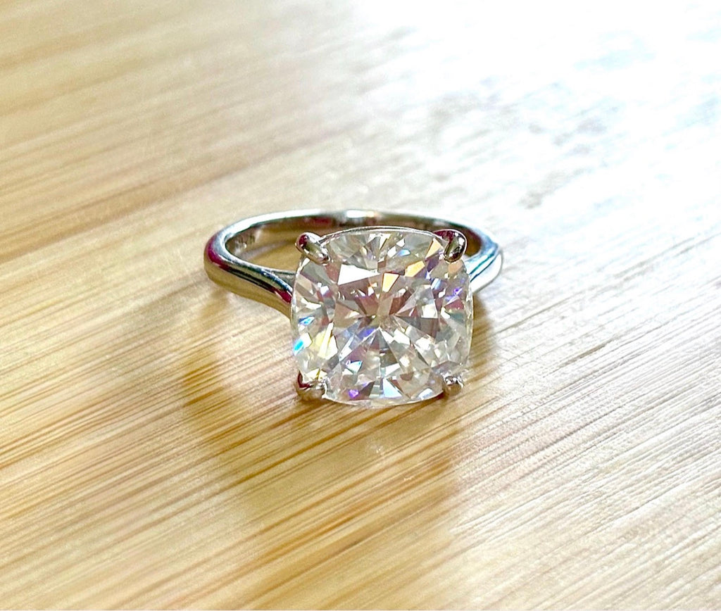Moissanite ring. A 9ct certified cushion-cut *crushed ice* faceted Moissanite solitaire statement ring. Did someone order extra sparkles?!
