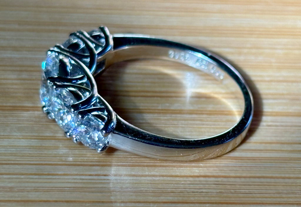 Moissanite ring. A 2.5ctw certified Moissanite ring, for those who want plenty of sparkle but a daintier ring! This feminine 5-stone design is just the thing!