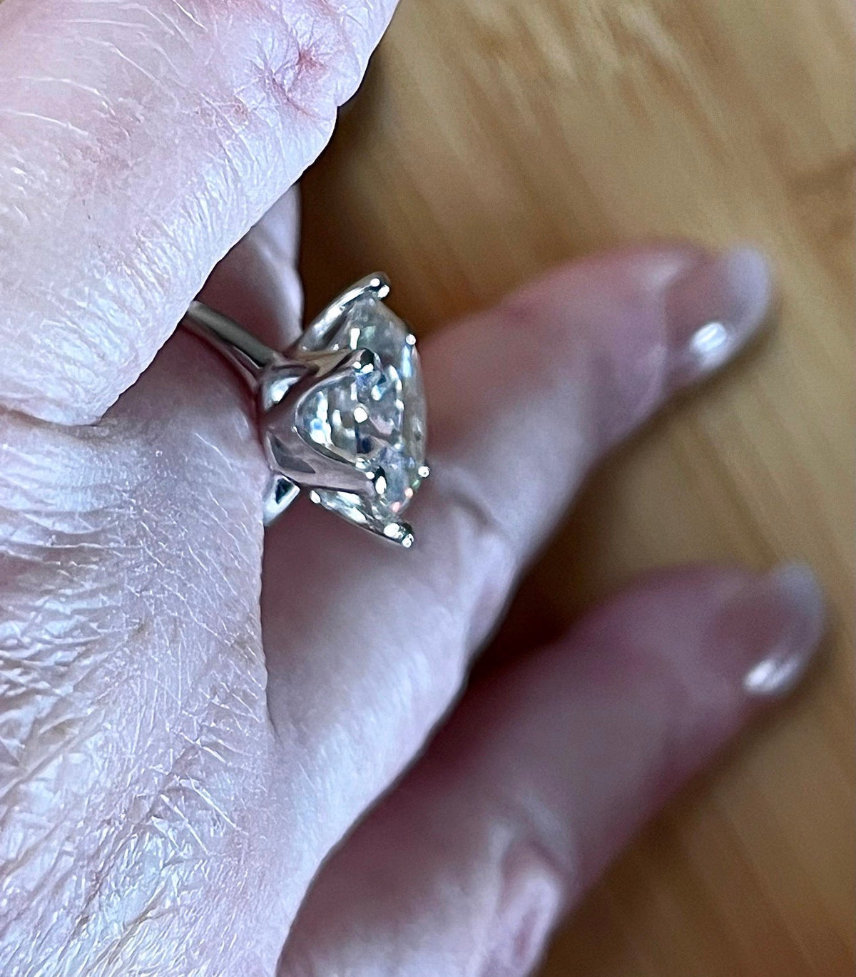 Moissanite ring. A gorgeous 10ct certified round brilliant Moissanite in a lovely crown setting, with 6 prongs and a sleek plain band!