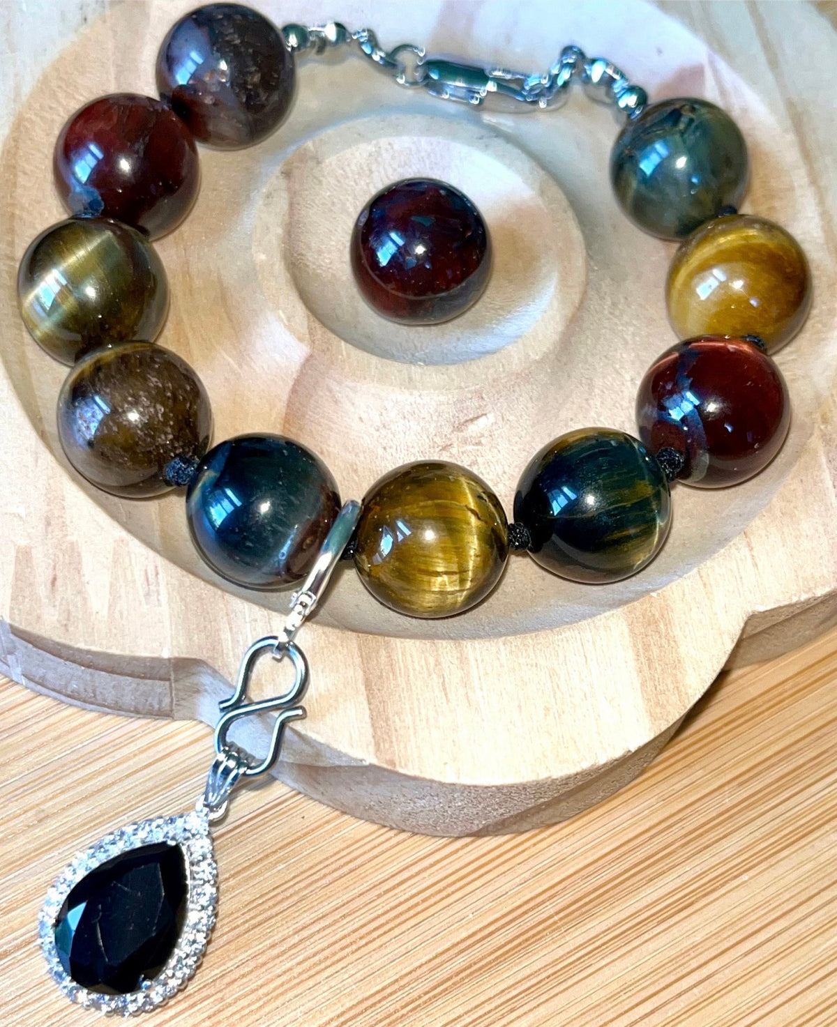 Tiger’s eye bracelet. 100% natural, highly chatoyant 14mm tricolored tiger’s eye hand knotted bracelet! Also available without the knots!