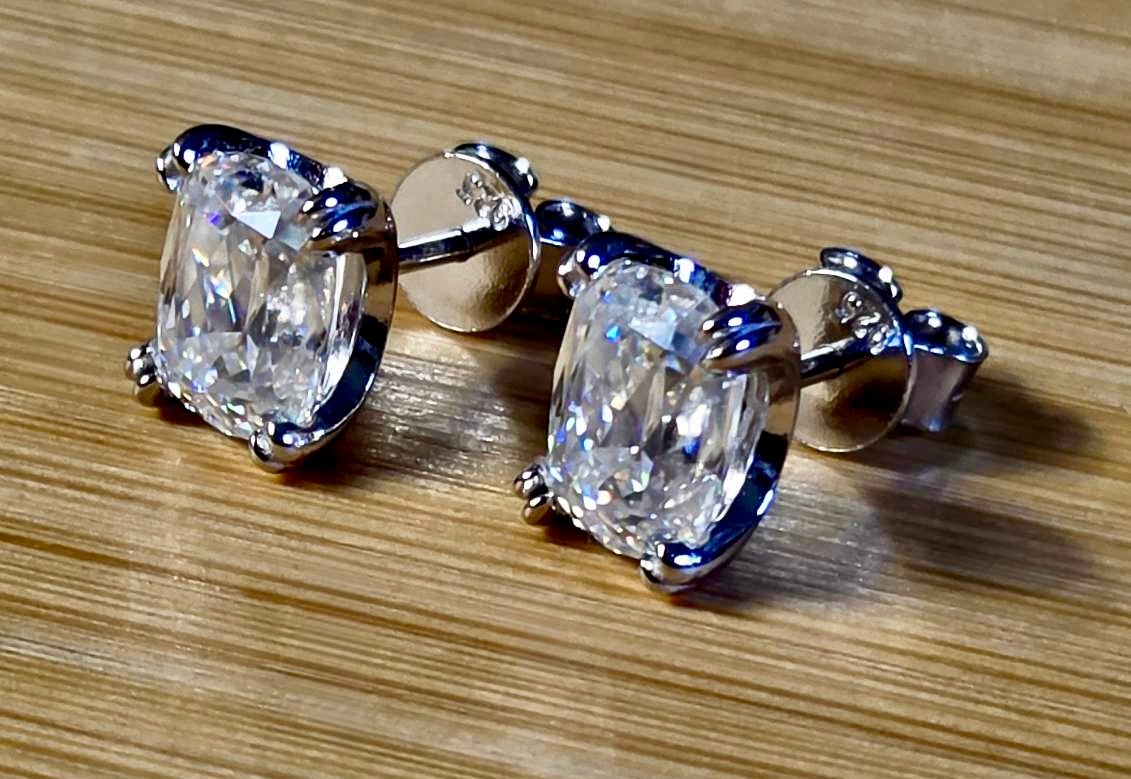 6ctw Ashoka-cut Moissanites in Argentium silver, hand-cut by a Master lapidary! These studs are the highest of the high end!