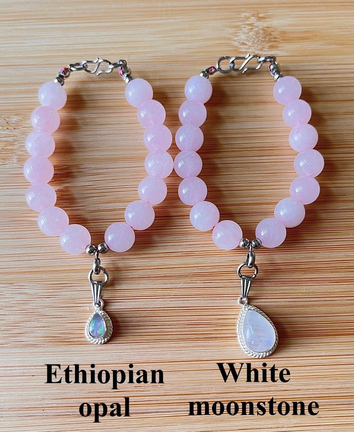 Madagascar rose quartz bracelet. 10mm beads with stainless steel components. The featured sterling silver pendants are sold separately.