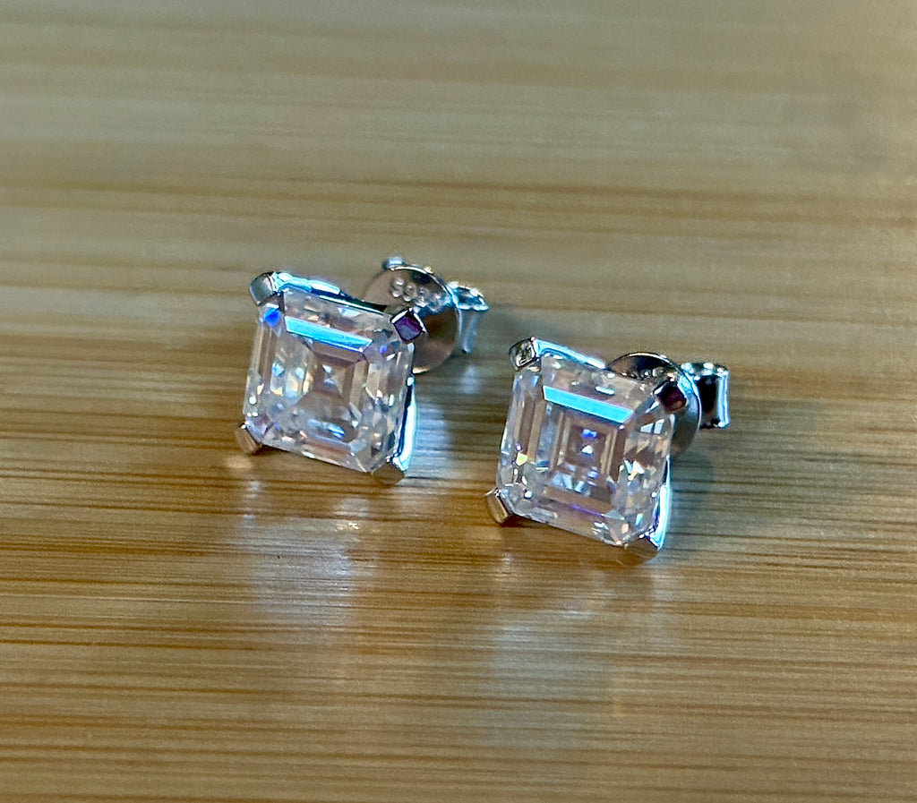Moissanite studs. A 6.4ctw *perfect* pair of DOUBLE certified Asscher-cut Moissanites in my custom 4-claw 935 ARGENTIUM silver mountings! Opulent!