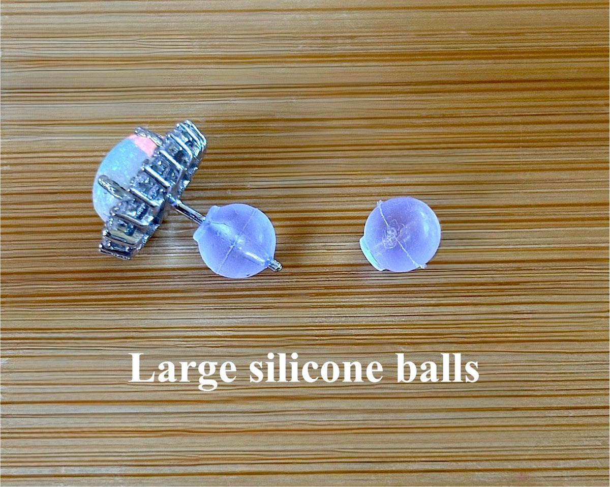 Locking earring backs (stainless steel), sterling silver replacement backs, sterling silver “UFO” security backs and silicone backs.