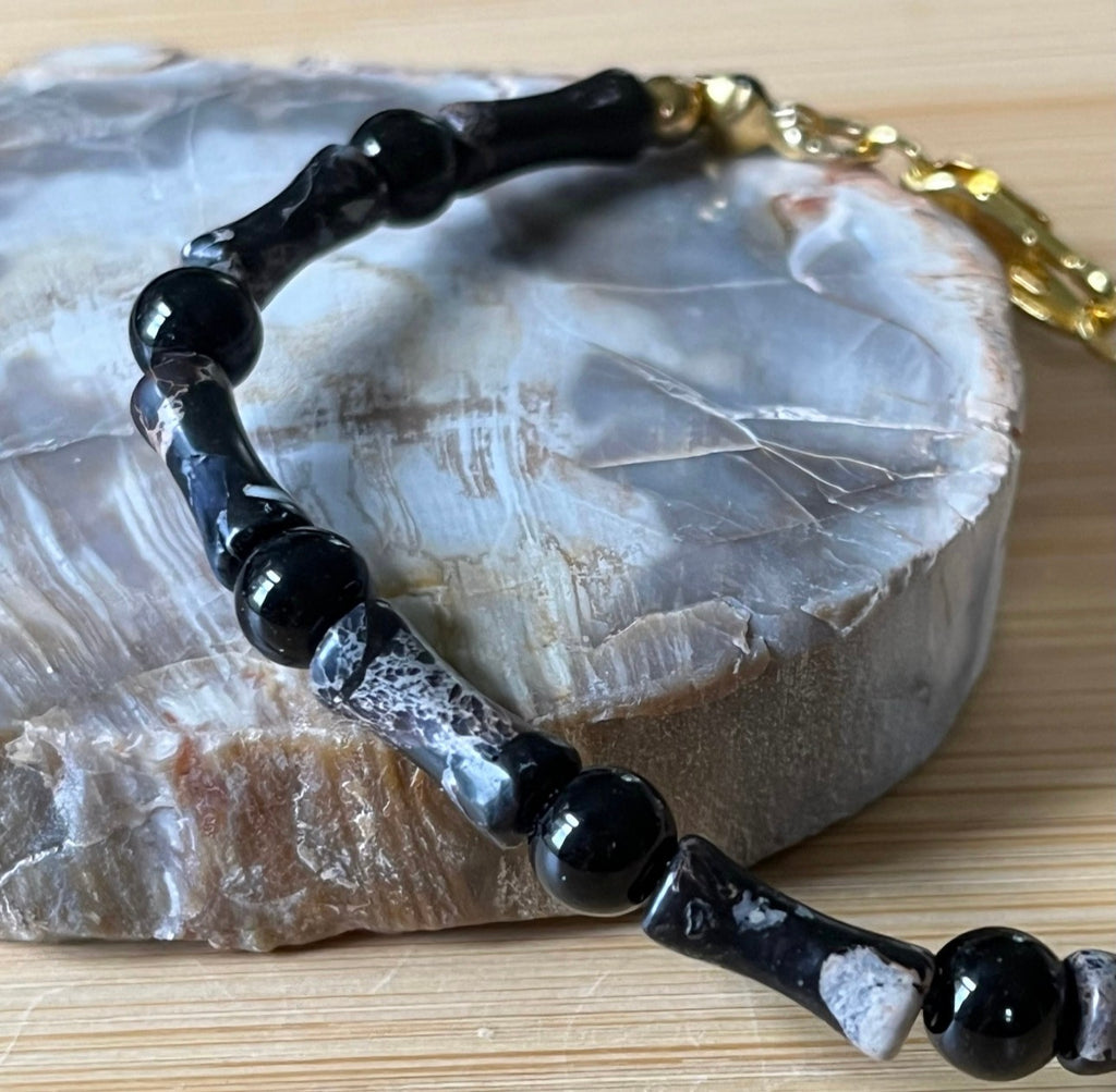 Sea sediment jasper and black onyx bracelet. The “Sticks & Stones” bracelet with your choice of golden or silvery stainless steel!