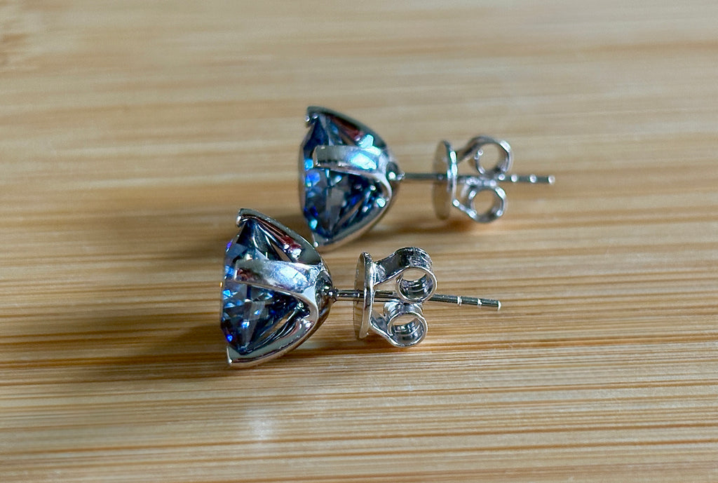 A *PHENOMENAL* 2.4cttw or 6cttw DOUBLE certified pair of octagonal-cut, star-faceted, royal blue Moissanite studs in 935 Argentium silver!