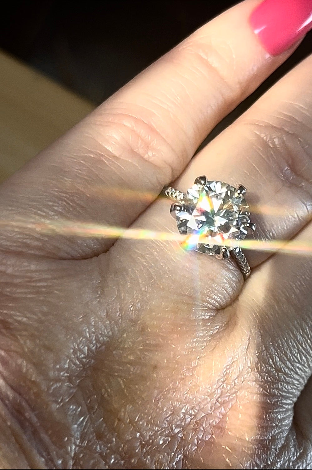 Moissanite ring. A certified 5ct Moissanite solitaire with zircon-accented shoulders, set in sterling silver and bathed in 18k!