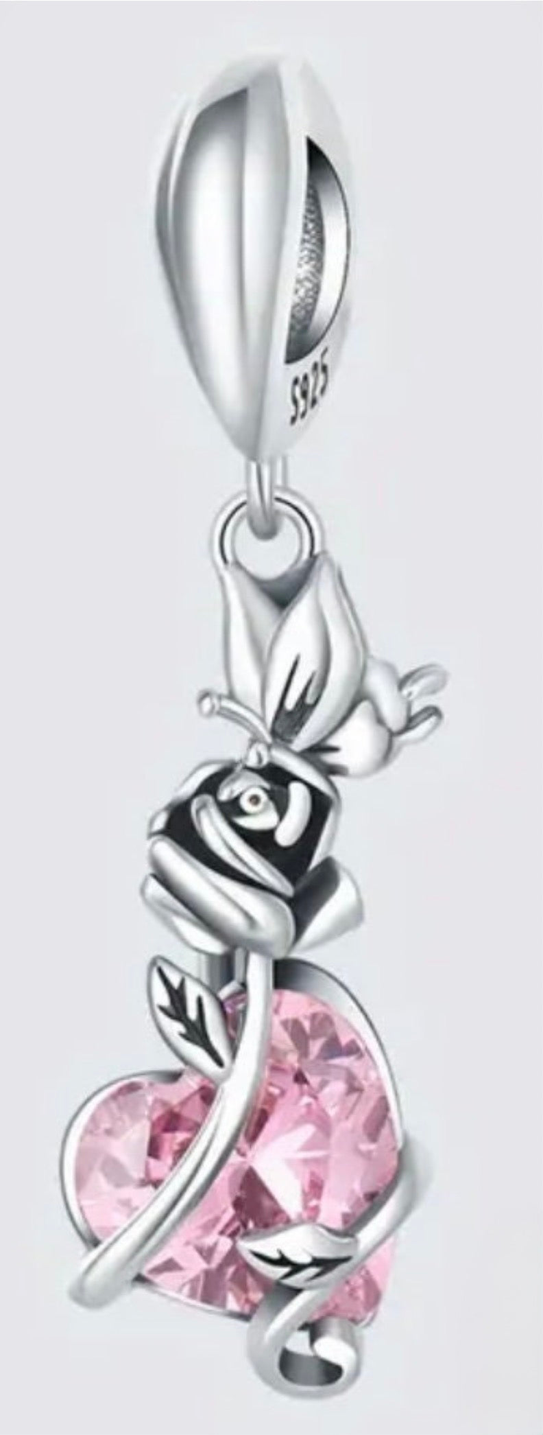 Dragonfly charm, rose charm, tree of life charm and lightning bug charm that glows in the dark! All solid sterling silver charms!