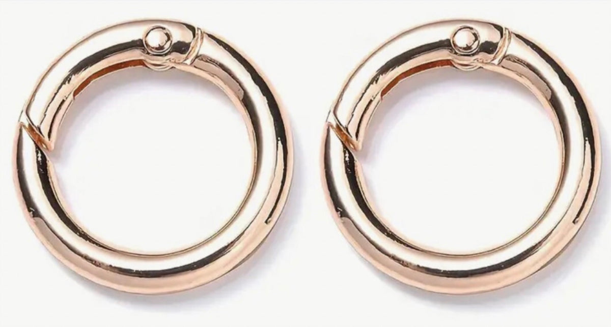 Sterling silver double lobster claw clasps, stainless steel charm keepers, 925 earring rings/charm holders and other miscellaneous jewelry items.