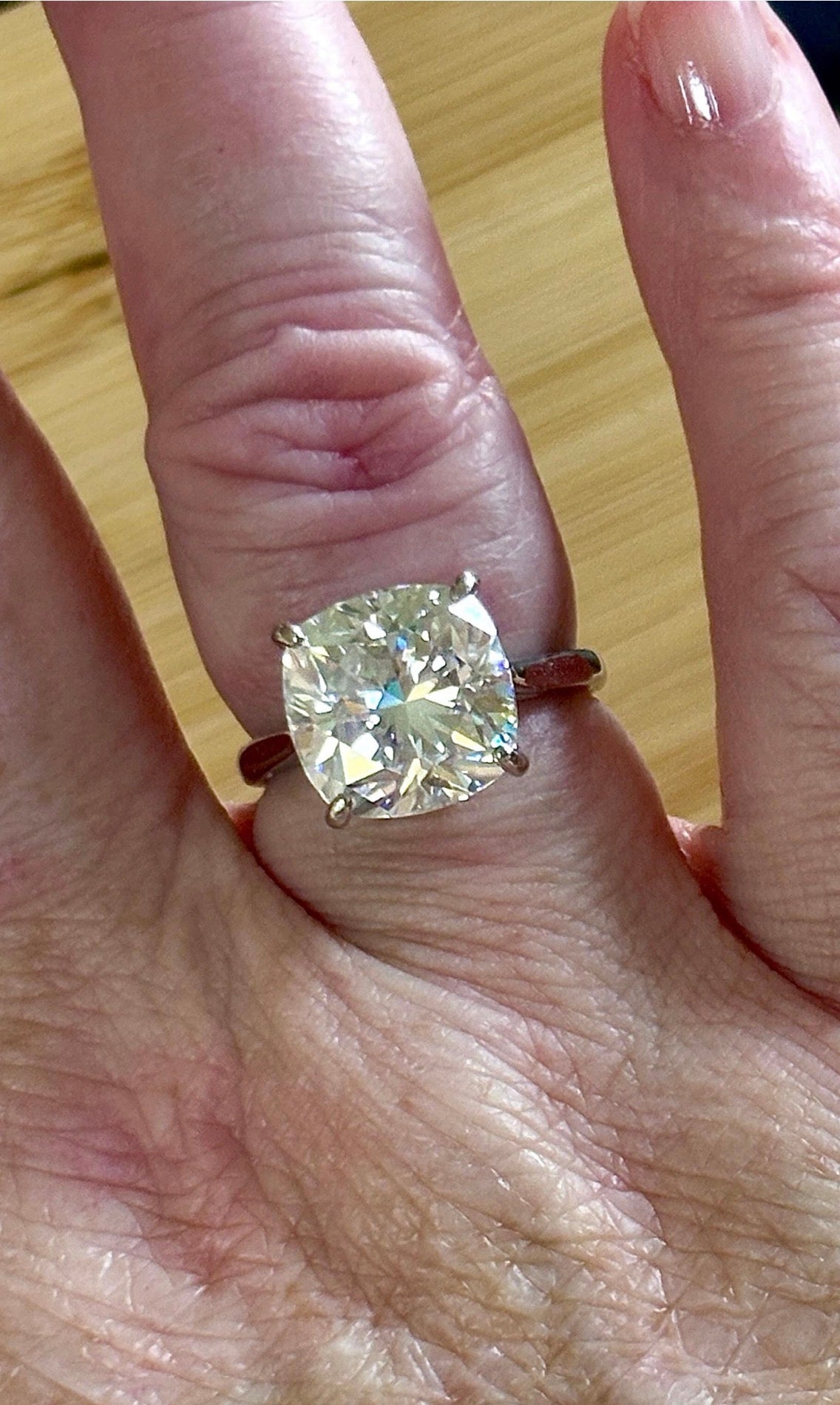 A fiery 9ct certified CLASSIC cushion-cut Moissanite solitaire, the ring of a certain princess (ex-princess?), but without the royal price tag! So indulge!