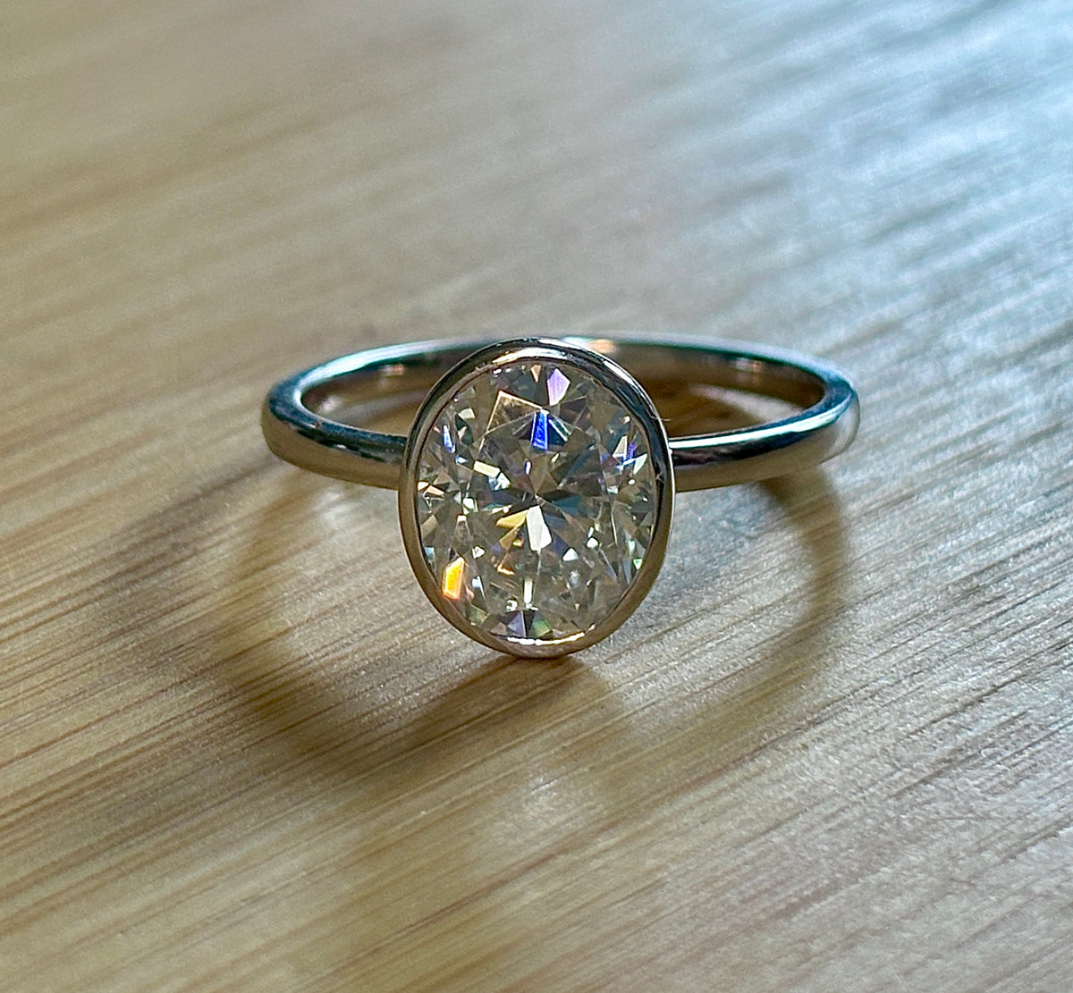 Moissanite ring. A 3ct oval in a hybrid basket + bezel of sterling OR Argentium silver! A Hand Knotted Jewelry EXCLUSIVE!