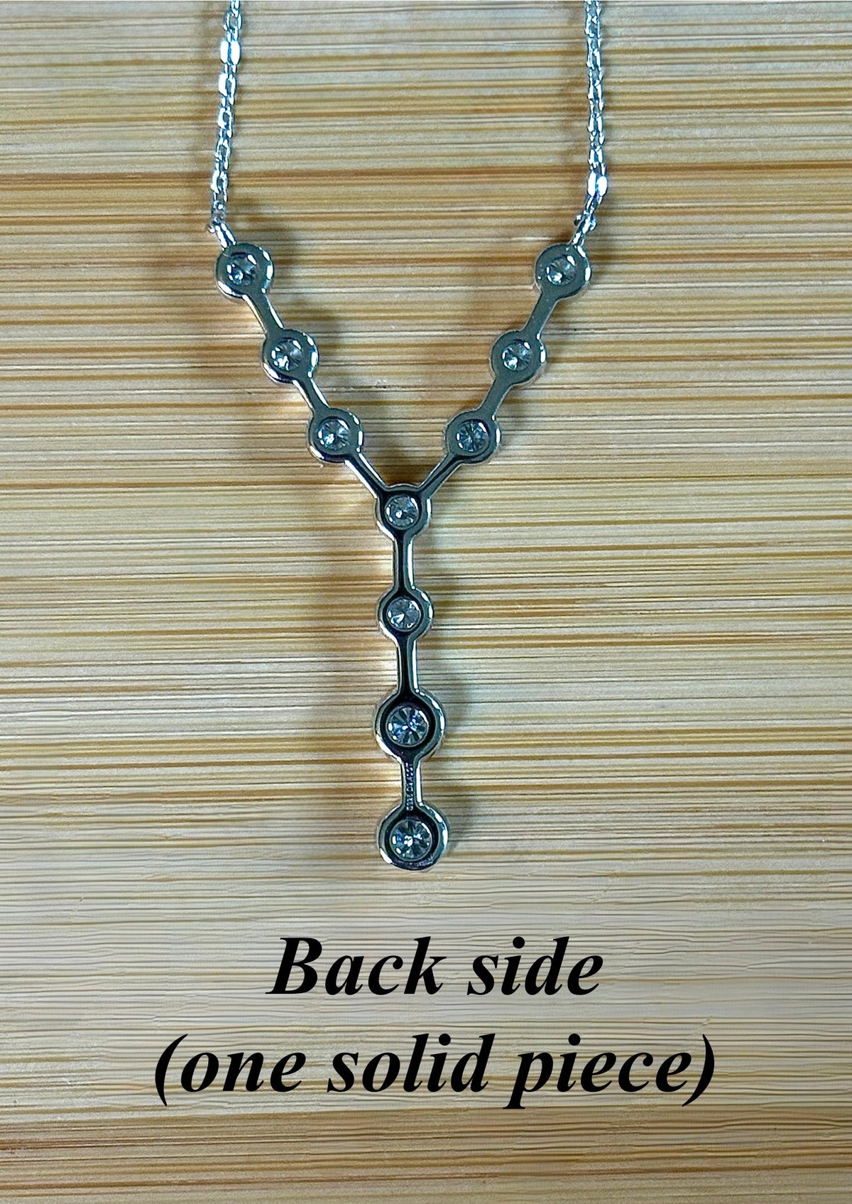 Moissanite neckpiece. A beautiful certified 1.4cttw Moissanite necklace featuring 10 round brilliants in a solid sterling bezel setting!