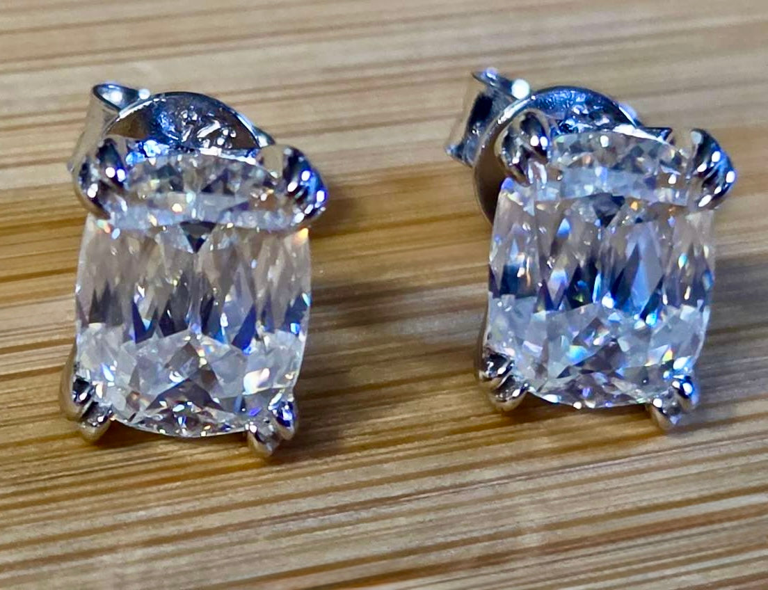 6ctw Ashoka-cut Moissanites in Argentium silver, hand-cut by a Master lapidary! These studs are the highest of the high end!