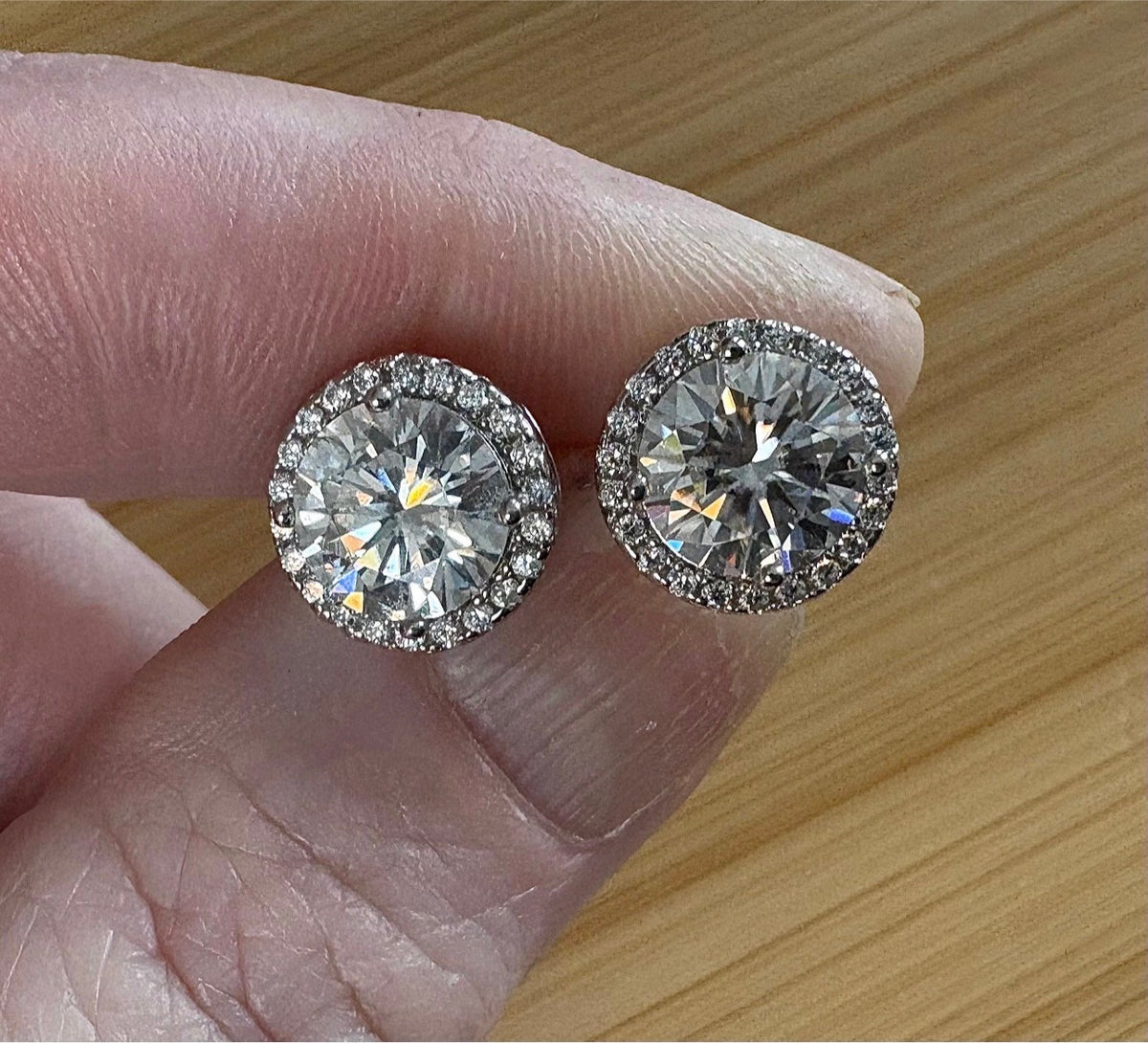 Moissanite earrings. 2.96cttw Moissanite halo stud earrings in sterling silver and 18k! Purely exquisite and red-carpet glamorous!