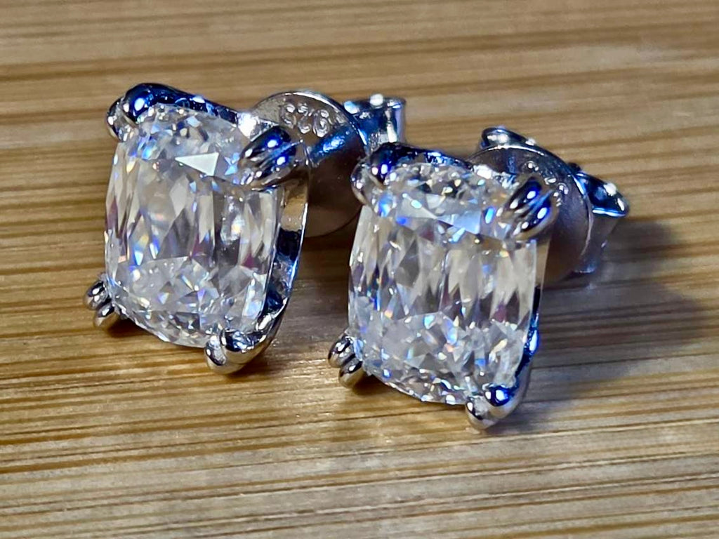 6ctw Ashoka-cut Moissanites in Argentium silver, hand-cut by a Master lapidary! These studs are the highest of the high end!