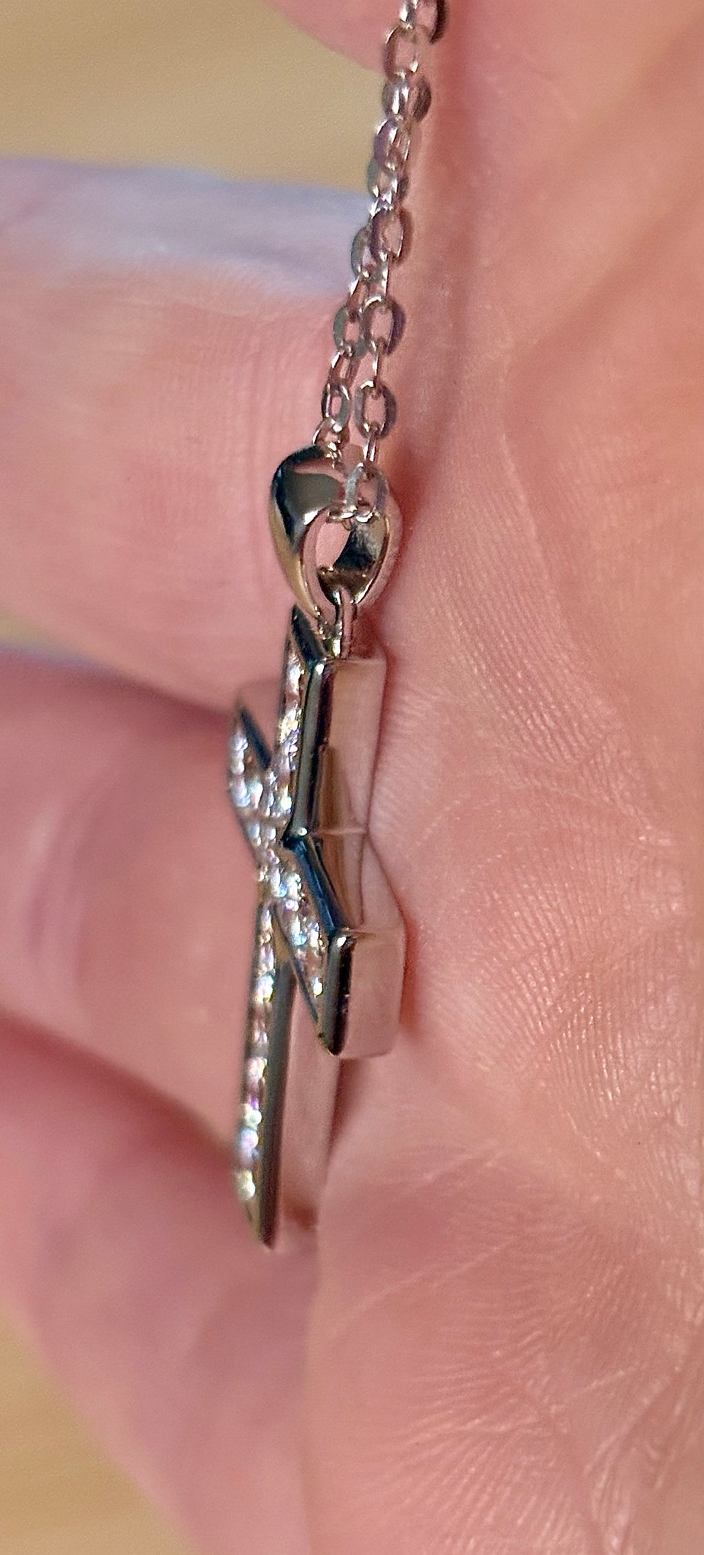 Moissanite necklace. A beautiful 2.2cttw certified Moissanite cross with channel-style stone setting. Classy, elegant, contemporary and très chic!