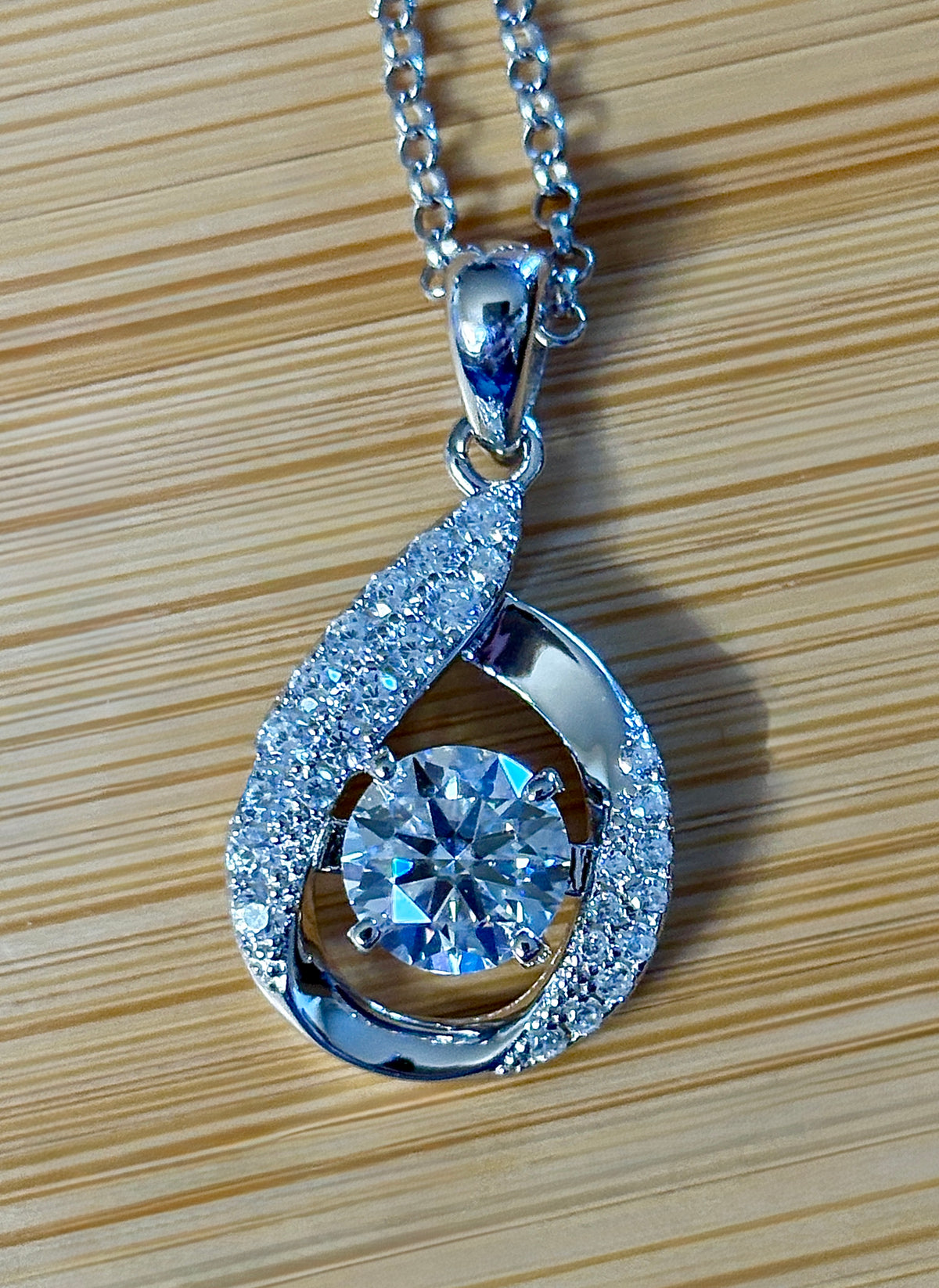 Moissanite necklace. A 1ct 8H8A certified Moissanite water drop-shaped pendant with white zircons, on a nicely weighted rolo chain with lobster claw clasp!