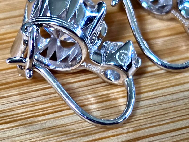 A Victorian inspired 4.2cttw certified pair of Moissanite 2-stone buckle back earrings in Argentium silver! Minimalist glam!