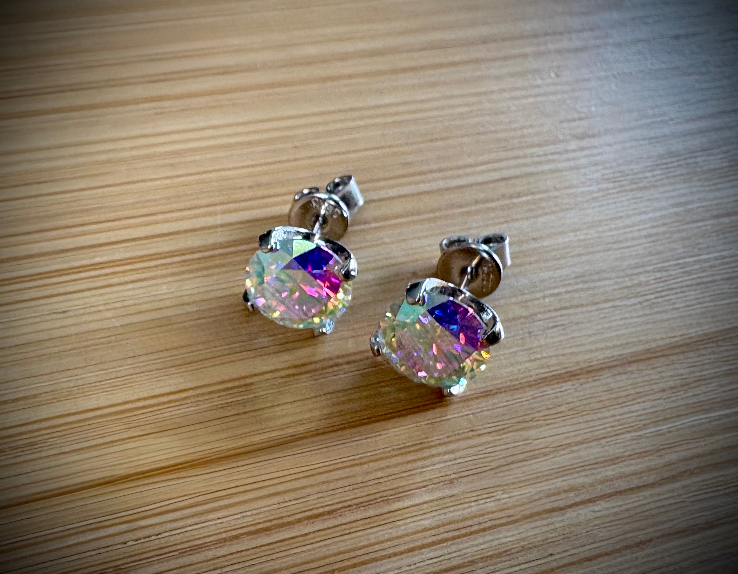 6ctw Moissanite “Kaleidoscope” studs! A pair of colorful, color-shifting, MESMERIZING Moissanite studs, DOUBLE certified and flashy in 18k plated sterling silver!