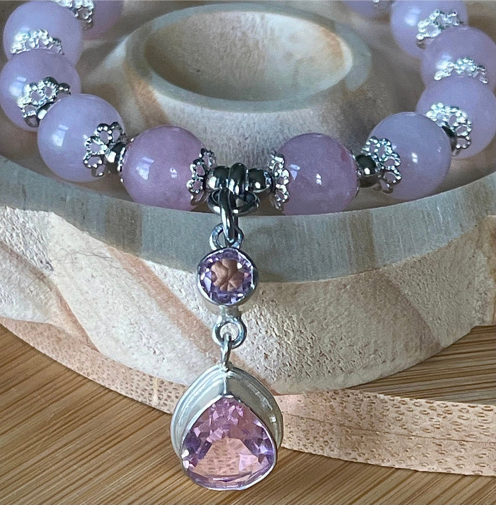 Rose quartz bracelet with 10mm Brazilian rose quartz beads and durable stainless steel components! The morganite pendant is optional.