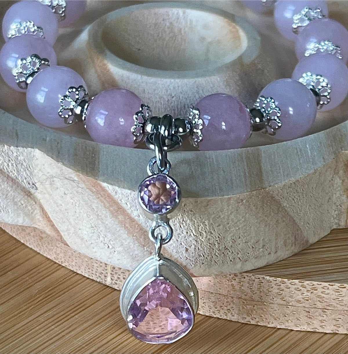 Rose quartz bracelet with 10mm Brazilian rose quartz beads and durable stainless steel components! The morganite pendant is optional.