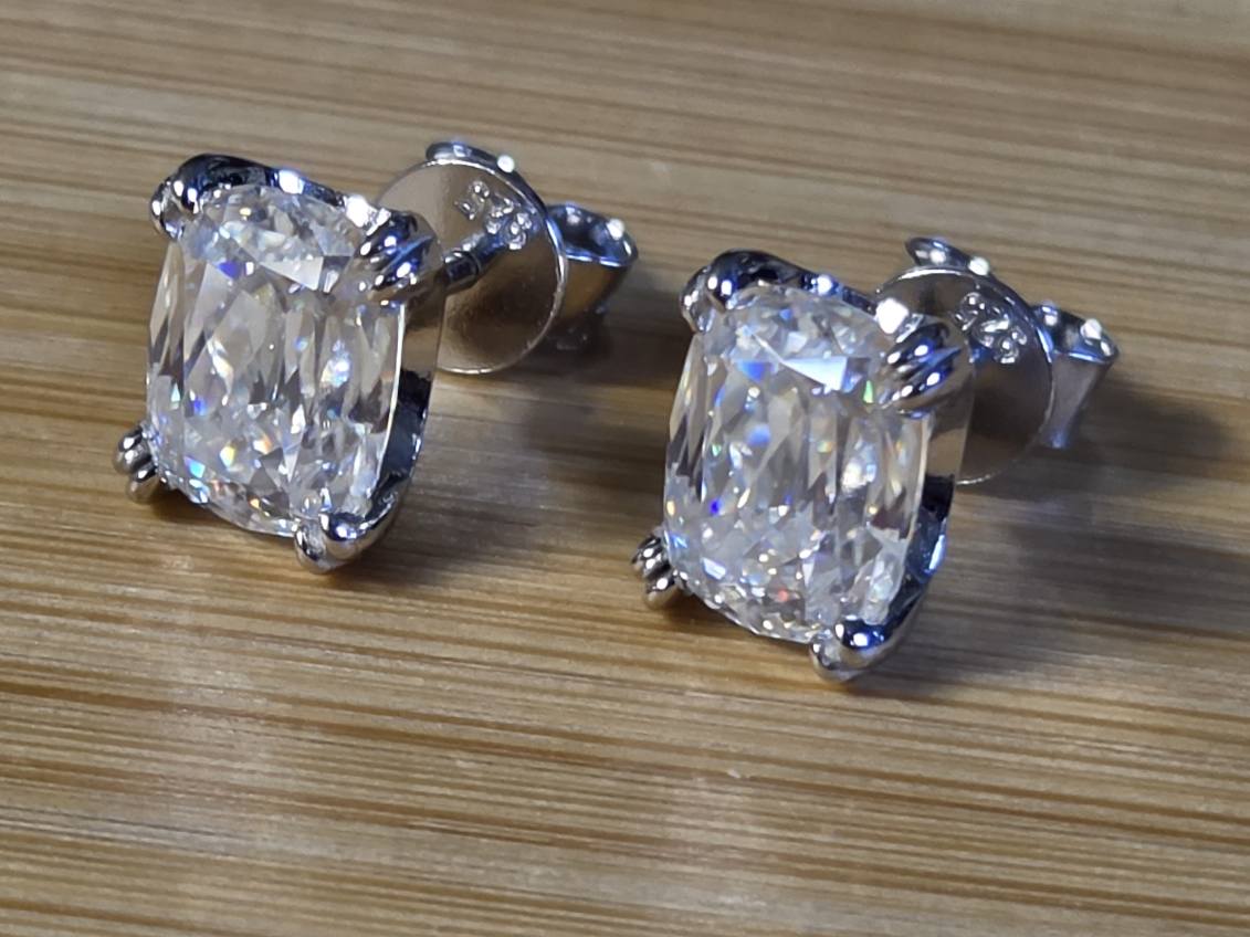 6ctw Ashoka-cut Moissanites in Argentium silver, hand-cut by a Master lapidary! These studs are the highest of the high end!
