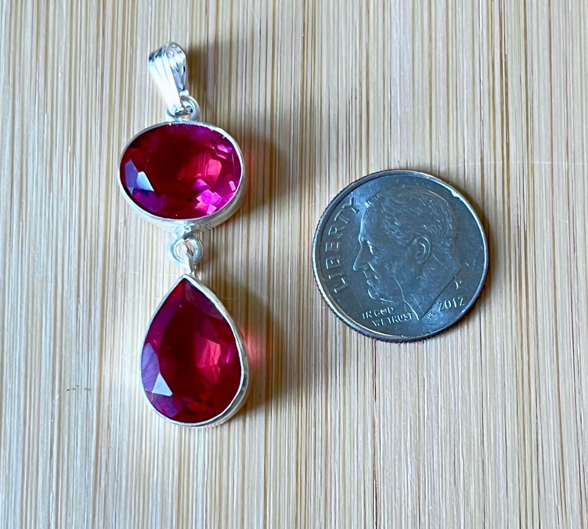 Rubellite tourmaline pendant, citrine pendant, London blue topaz pendant and manmade opal pendant. All solid sterling silver pendants!